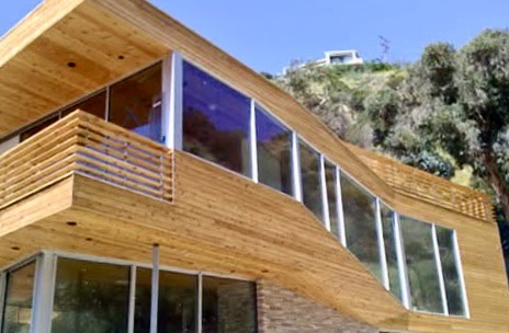 AJ Build — Modern farmhouse exterior with custom wood fencing