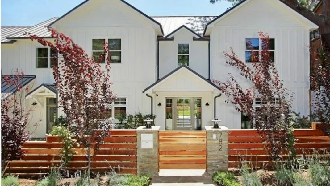 AJ Build — Modern farmhouse with wood and glass construction